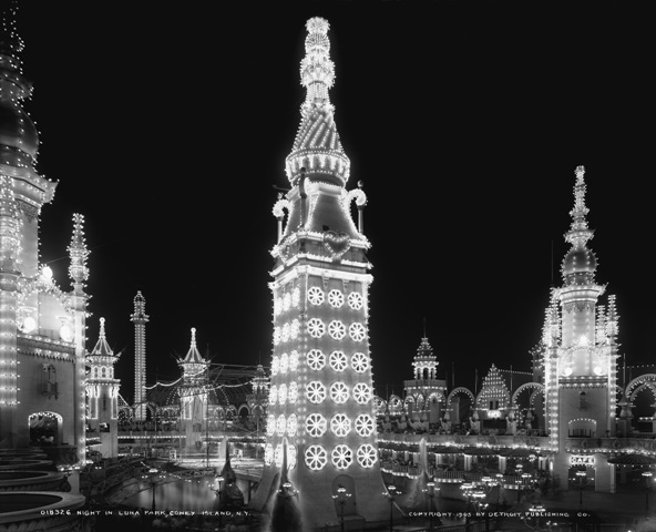 A nighttime photograph of Luna Park's Electric Tower covered in thousands of bright lights.