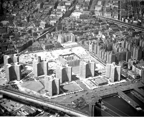 An aerial view from 1951 shows the construction of the Governor Alfred E. Smith Houses over the old Cherry Street neighborhood.